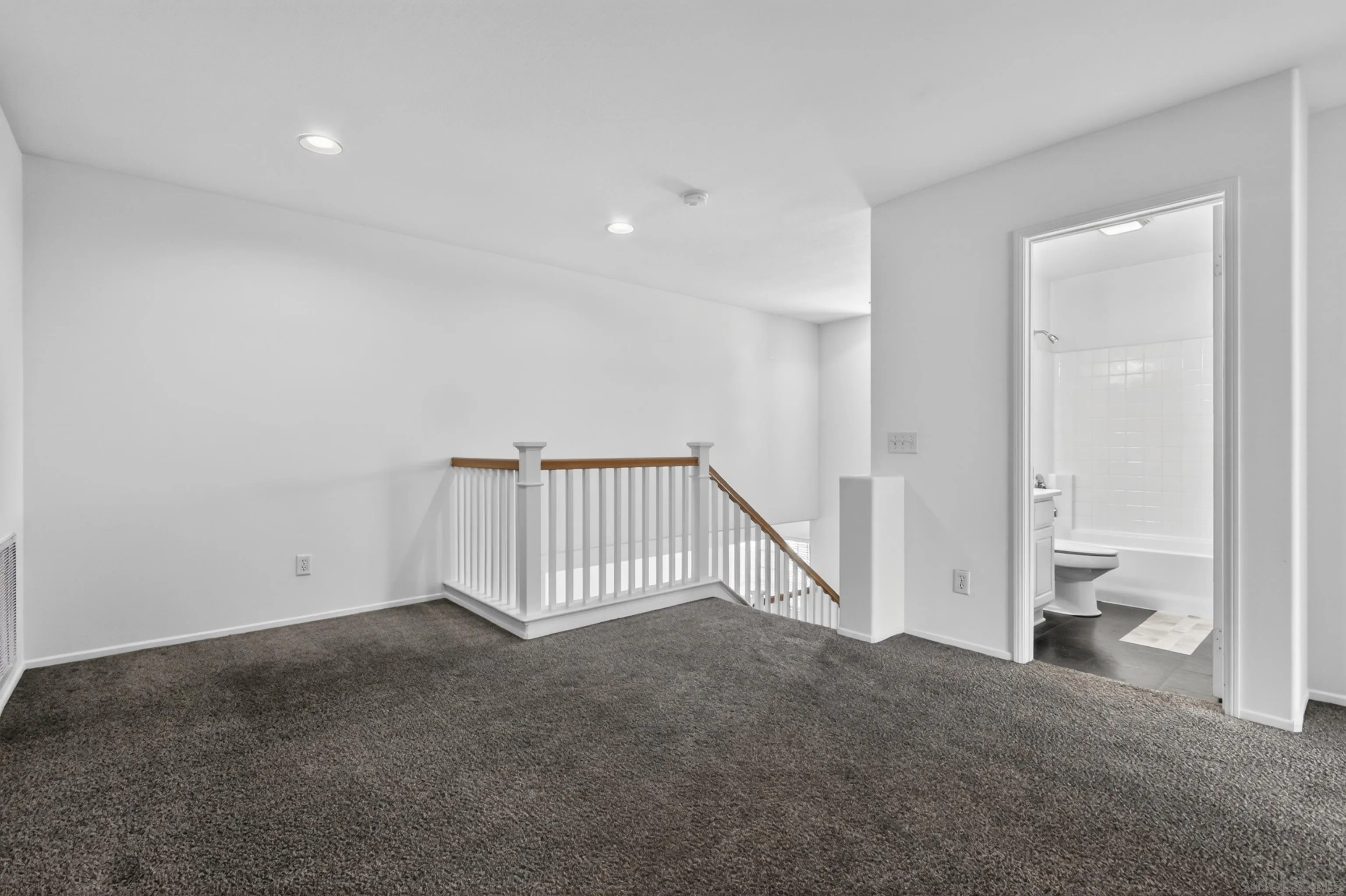 1432 Belmont Park Road Oceanside, CA 92057 - Photo 44 of 54 a view of a livingroom with a staircase