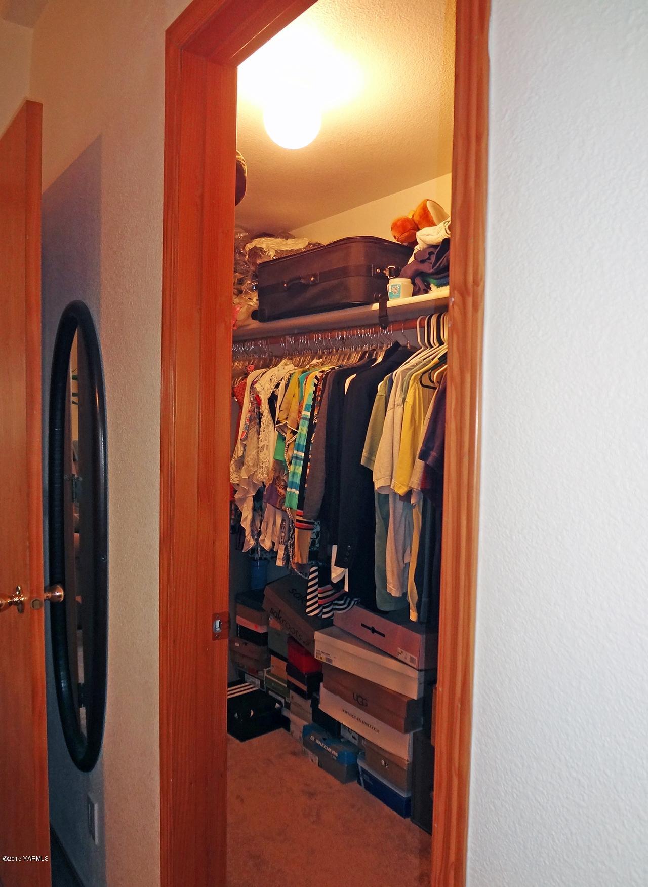 231 Rodgers Road Yakima, WA 98908 - Photo 15 of 29 a view of walk in closet with clothes and shoes