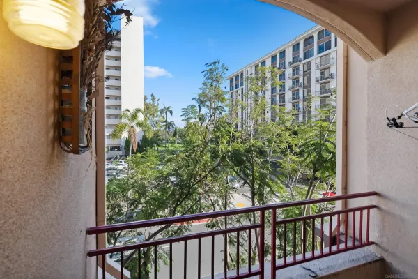 a view of a balcony with plants