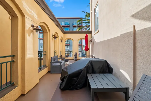a view of balcony with furniture and outdoor seating
