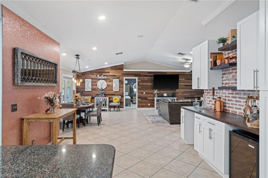 18281 Fuchsia Road Fort Myers, FL 33967 - Photo 14 of 37 a kitchen with lots of counter top space and stainless steel appliances