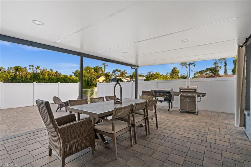 18281 Fuchsia Road Fort Myers, FL 33967 - Photo 29 of 37 a view of a dining room with furniture