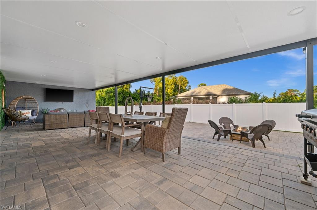 18281 Fuchsia Road Fort Myers, FL 33967 - Photo 30 of 37 a view of a tables and chairs in patio