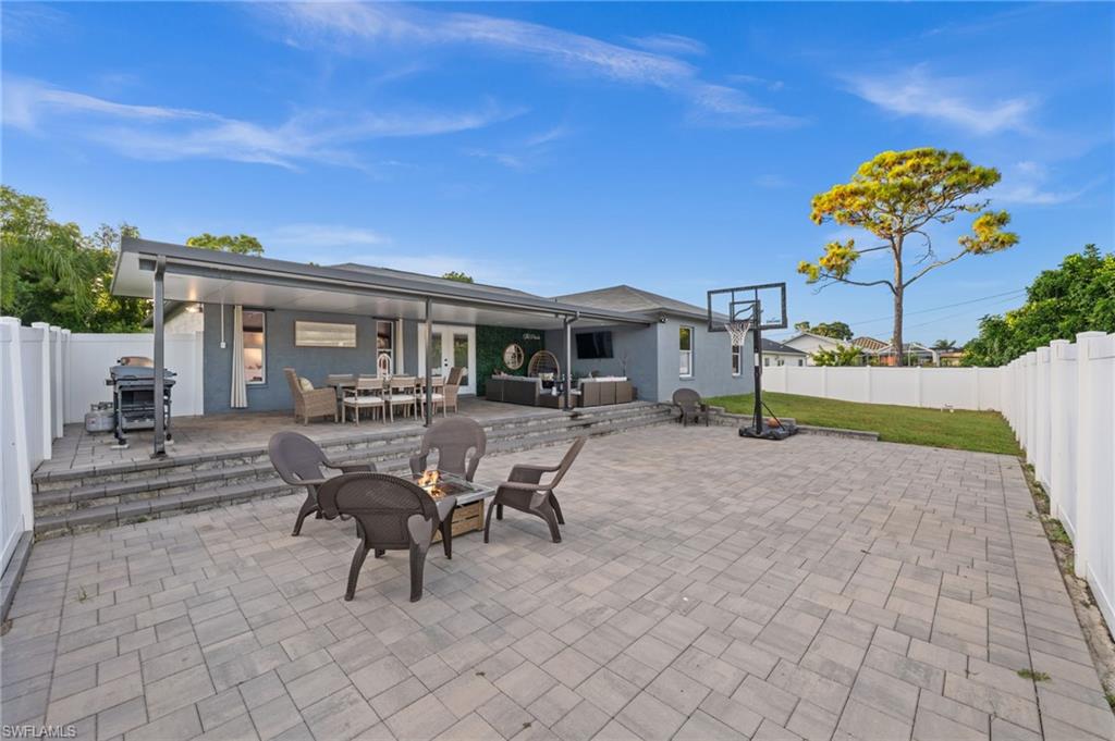 18281 Fuchsia Road Fort Myers, FL 33967 - Photo 33 of 37 a view of a house with backyard porch and sitting area