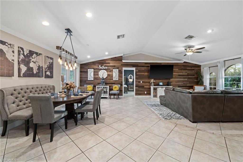 18281 Fuchsia Road Fort Myers, FL 33967 - Photo 9 of 37 a large kitchen with a table and chairs