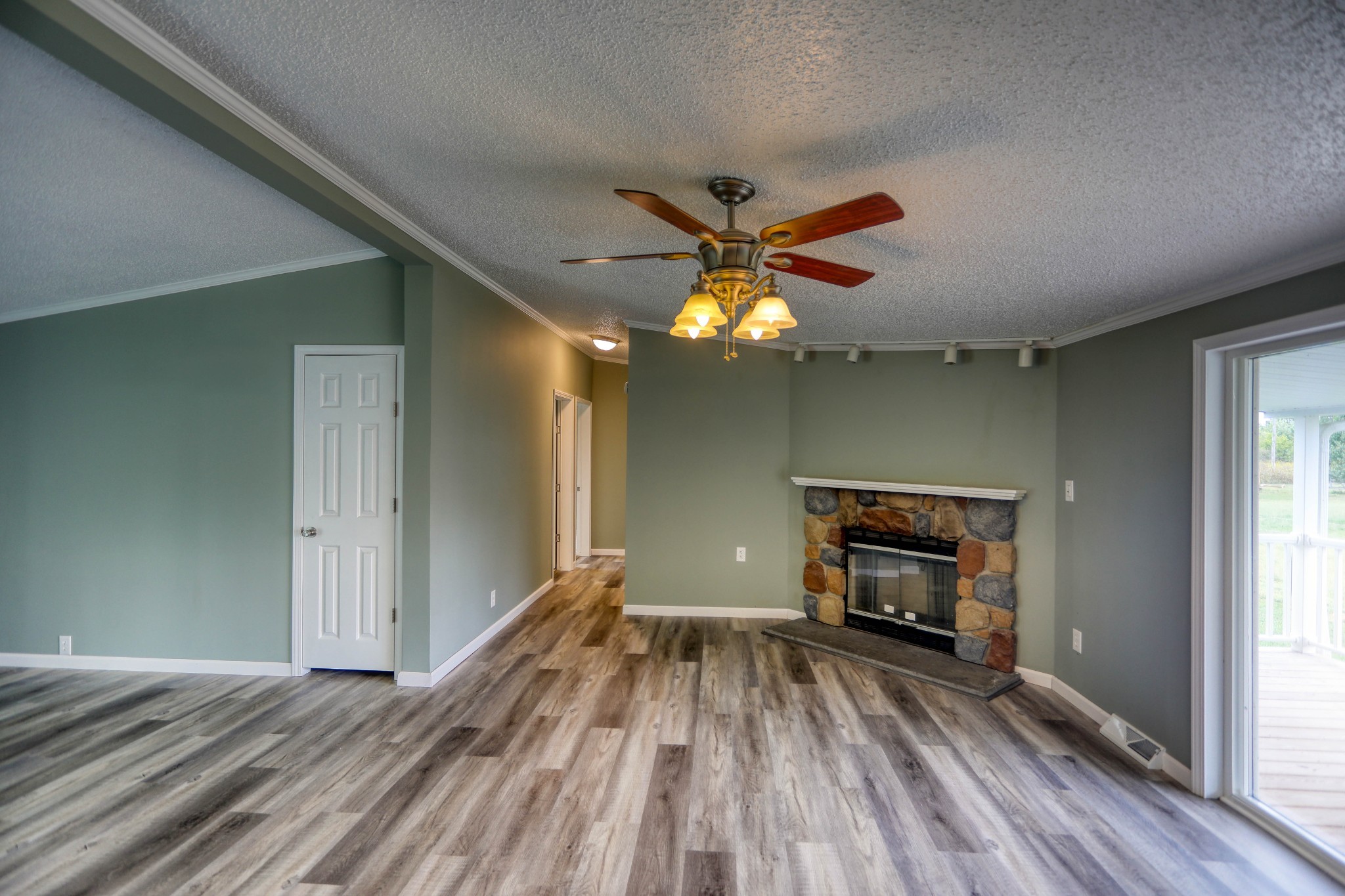 1834 Oak Grove Church Road Adolphus, KY 42120 - Photo 12 of 32 a view of a livingroom with a hall and a fireplace