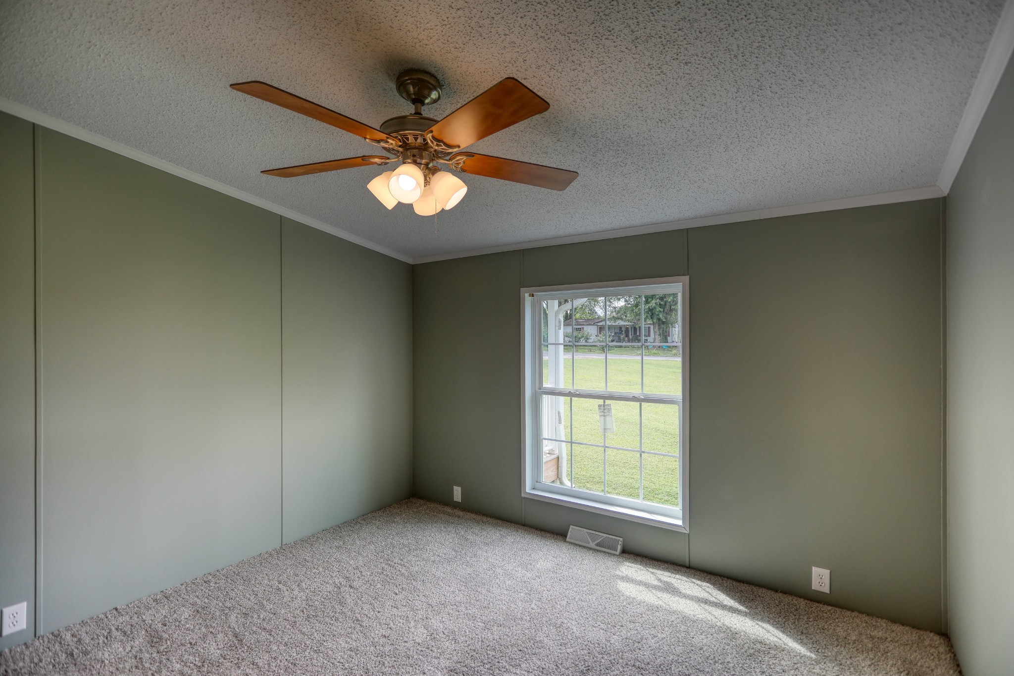 1834 Oak Grove Church Road Adolphus, KY 42120 - Photo 21 of 32 an empty room with a window and a fan