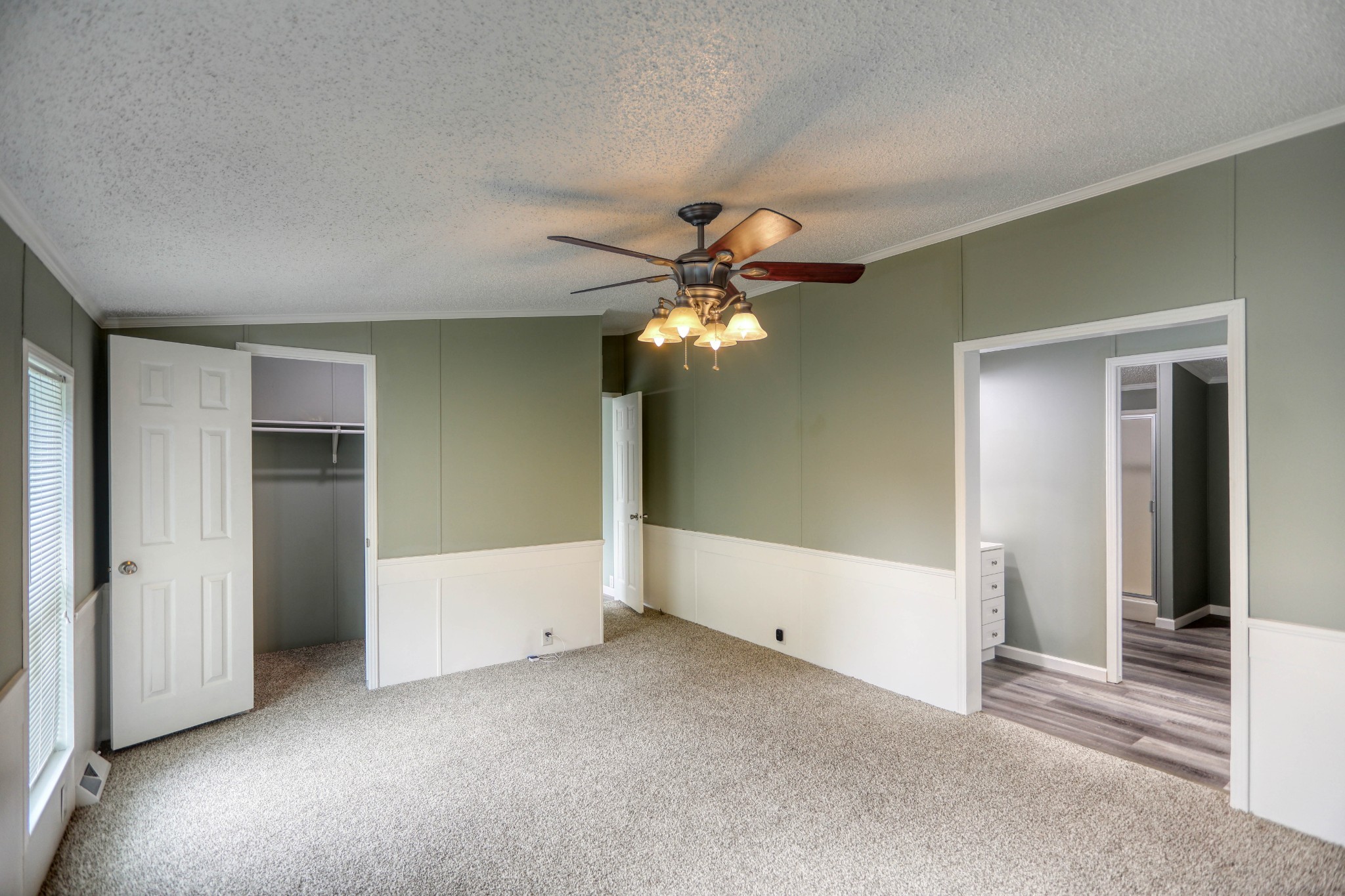 1834 Oak Grove Church Road Adolphus, KY 42120 - Photo 4 of 32 an empty room with closet and a chandelier fan