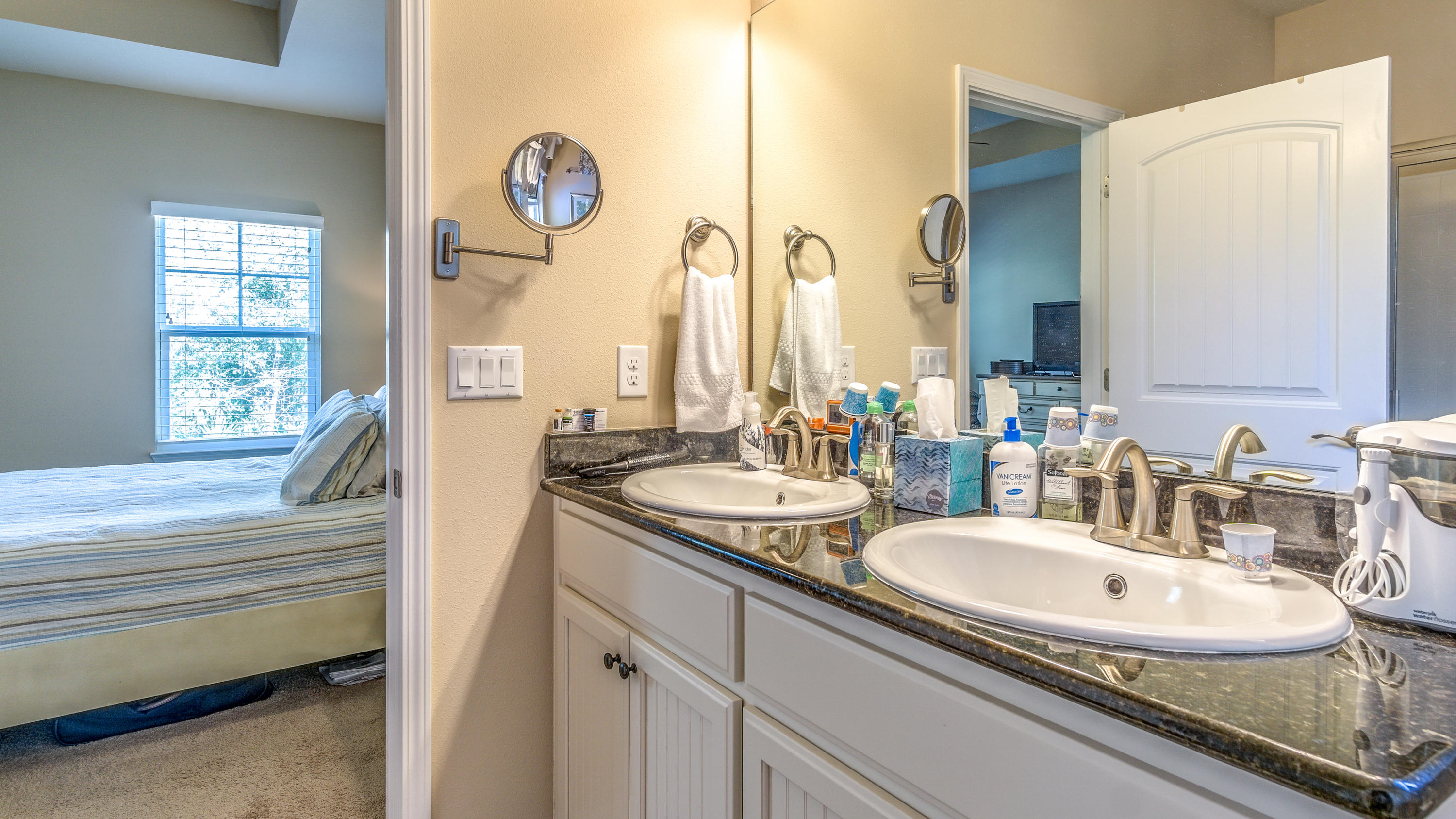 12 Benton Boulevard Freeport, FL 32439 - Photo 11 of 28 a bathroom with a sink and a mirror