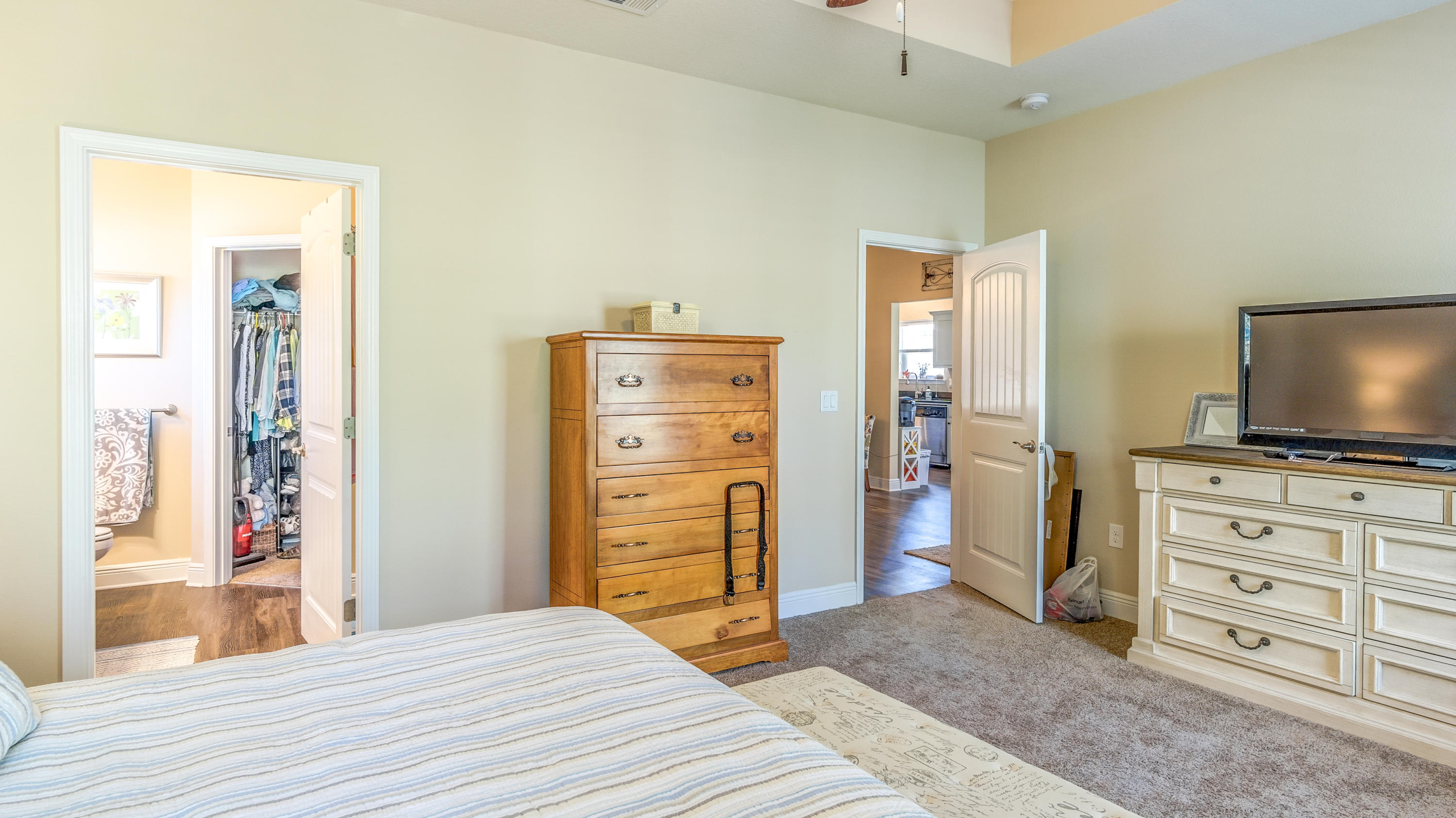 12 Benton Boulevard Freeport, FL 32439 - Photo 12 of 28 a bedroom with a bed and a television in it