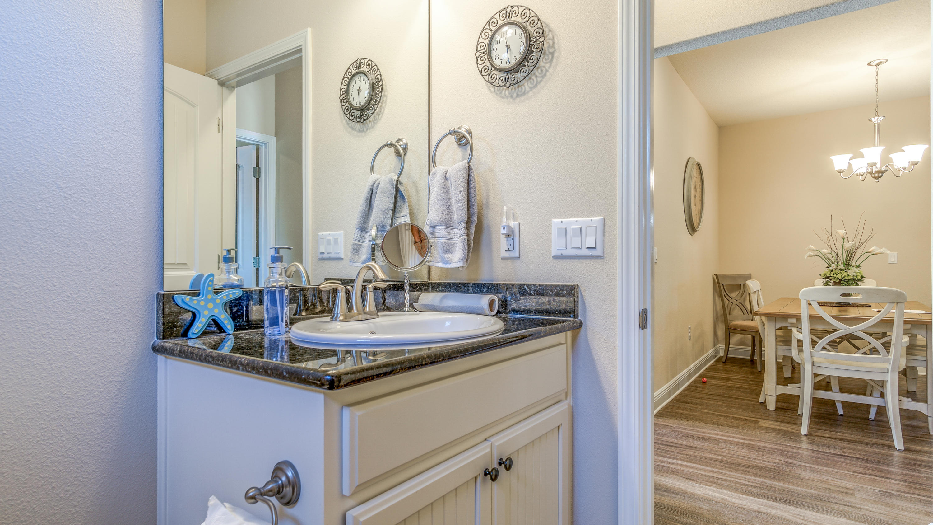 12 Benton Boulevard Freeport, FL 32439 - Photo 14 of 28 a bathroom with a sink and a mirror