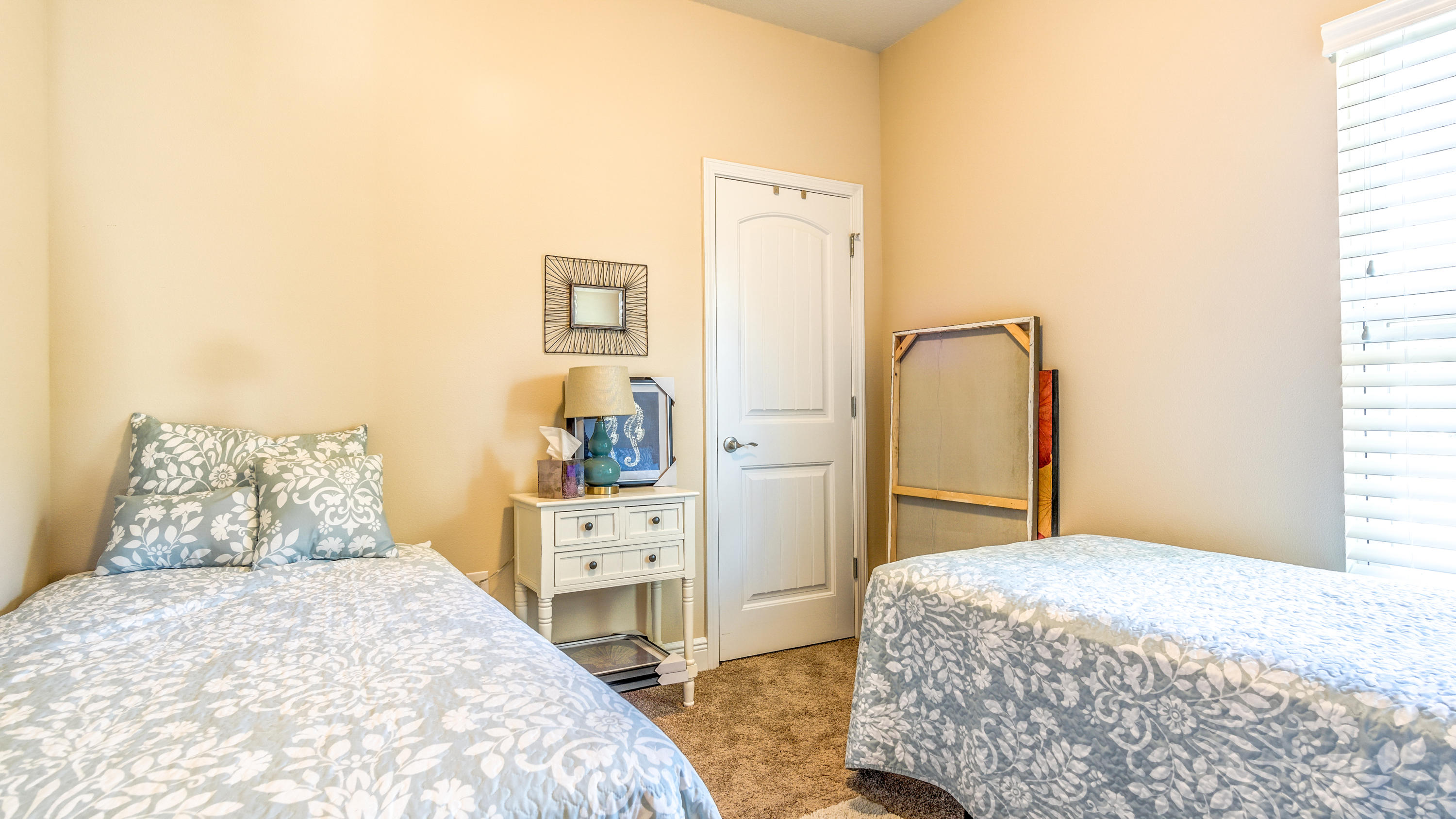 12 Benton Boulevard Freeport, FL 32439 - Photo 15 of 28 a bedroom with a bed and a dresser