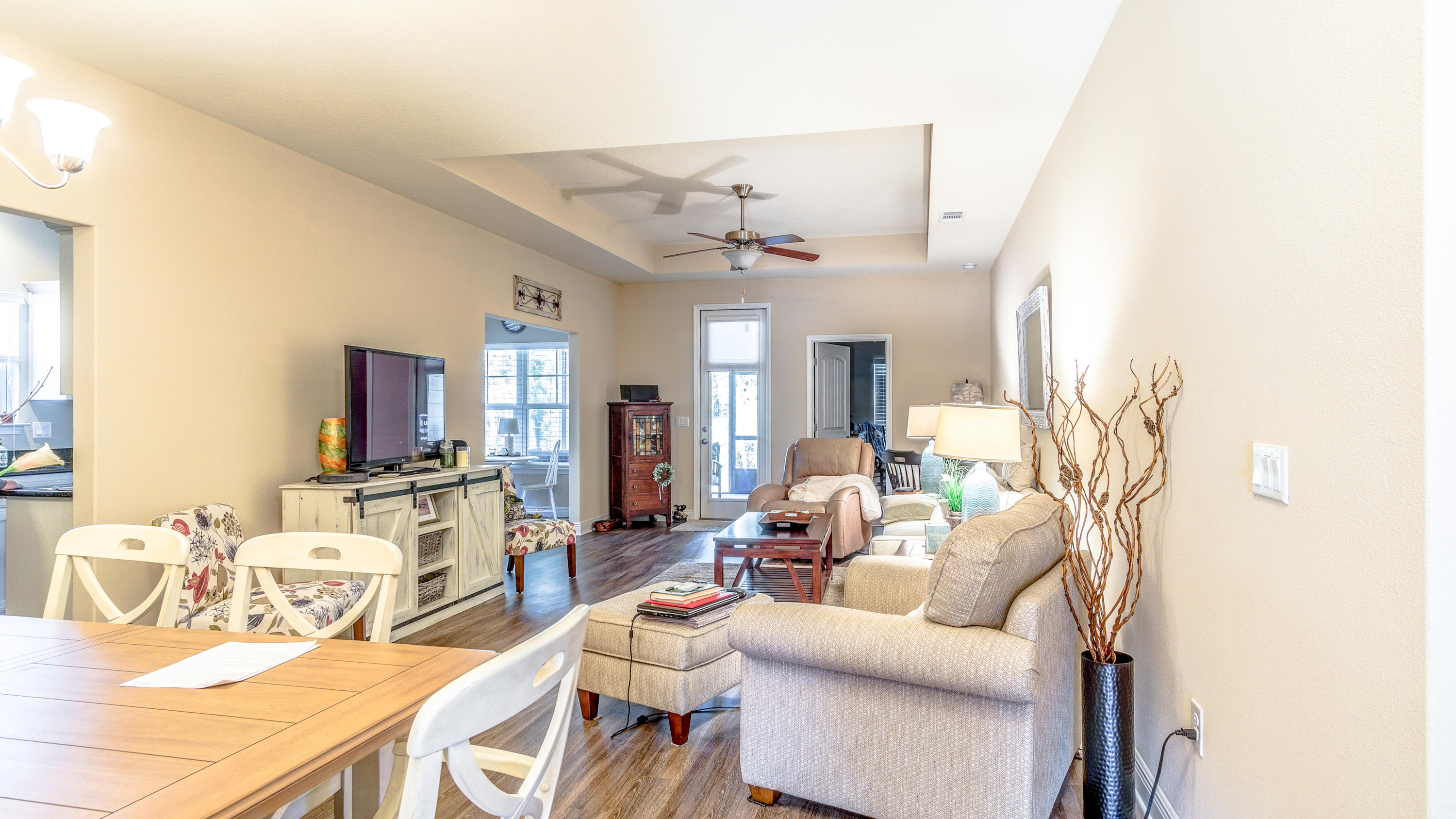 12 Benton Boulevard Freeport, FL 32439 - Photo 9 of 28 a living room with furniture and a flat screen tv