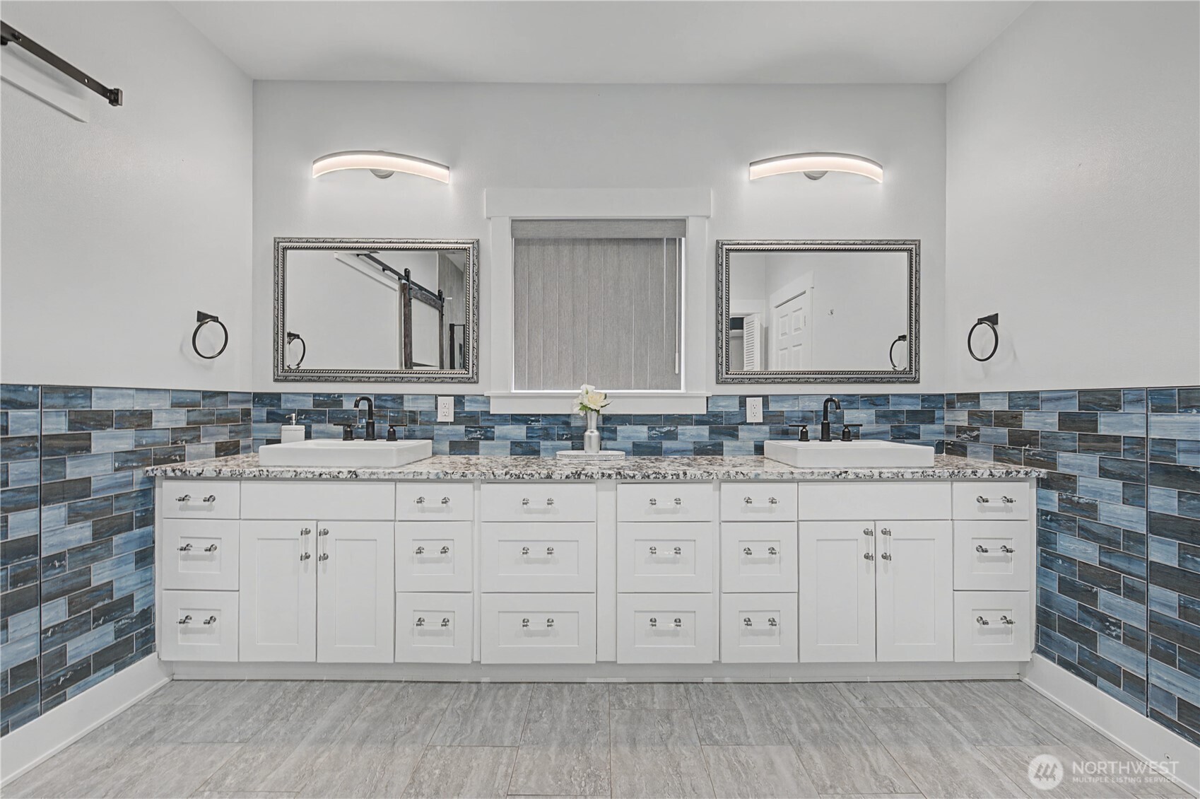 21347 Rd D.5 Soap Lake, WA 98851 - Photo 20 of 40 a bathroom with a granite countertop double vanity sink and mirror