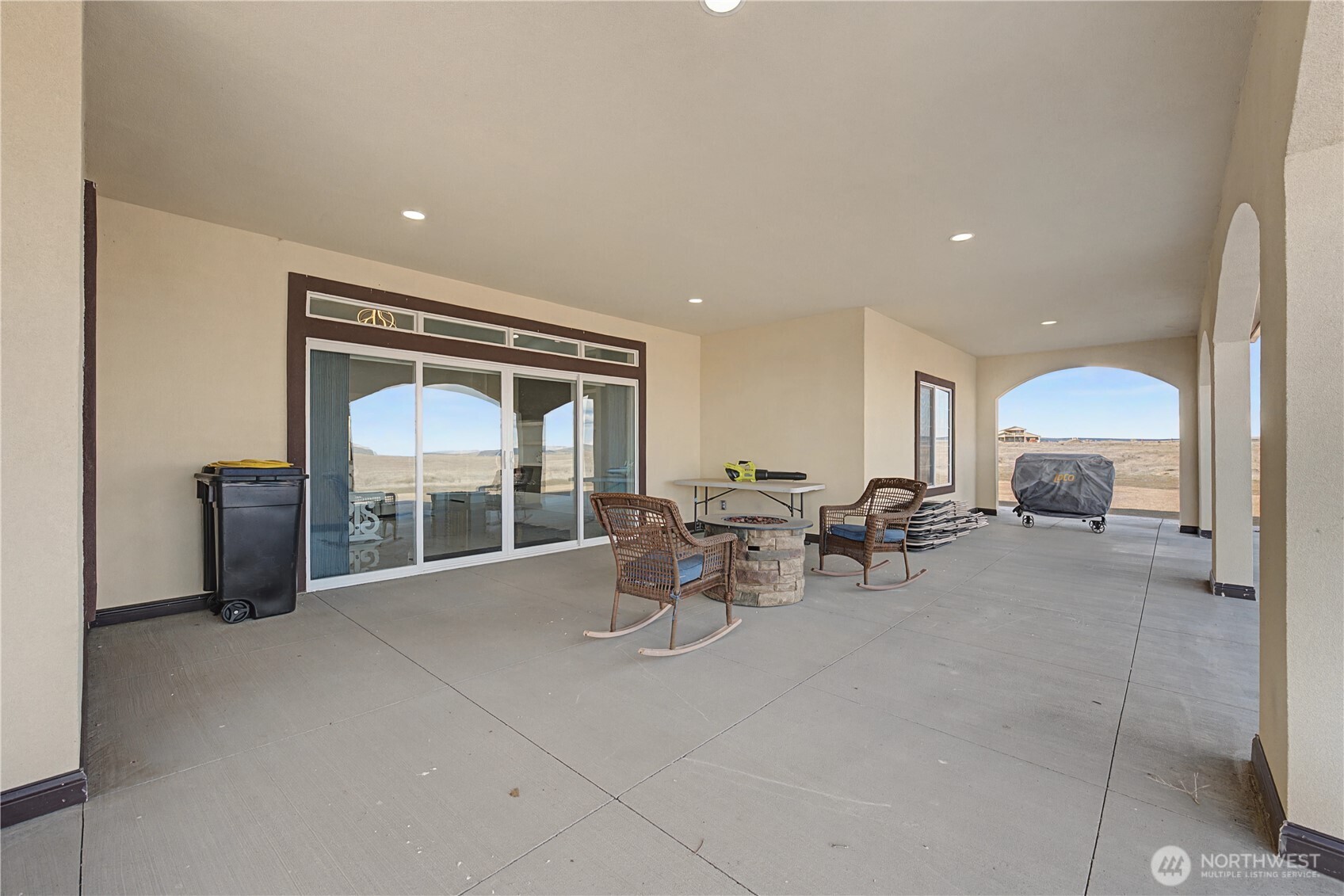 21347 Rd D.5 Soap Lake, WA 98851 - Photo 25 of 40 a view of a livingroom with furniture and floor to ceiling window