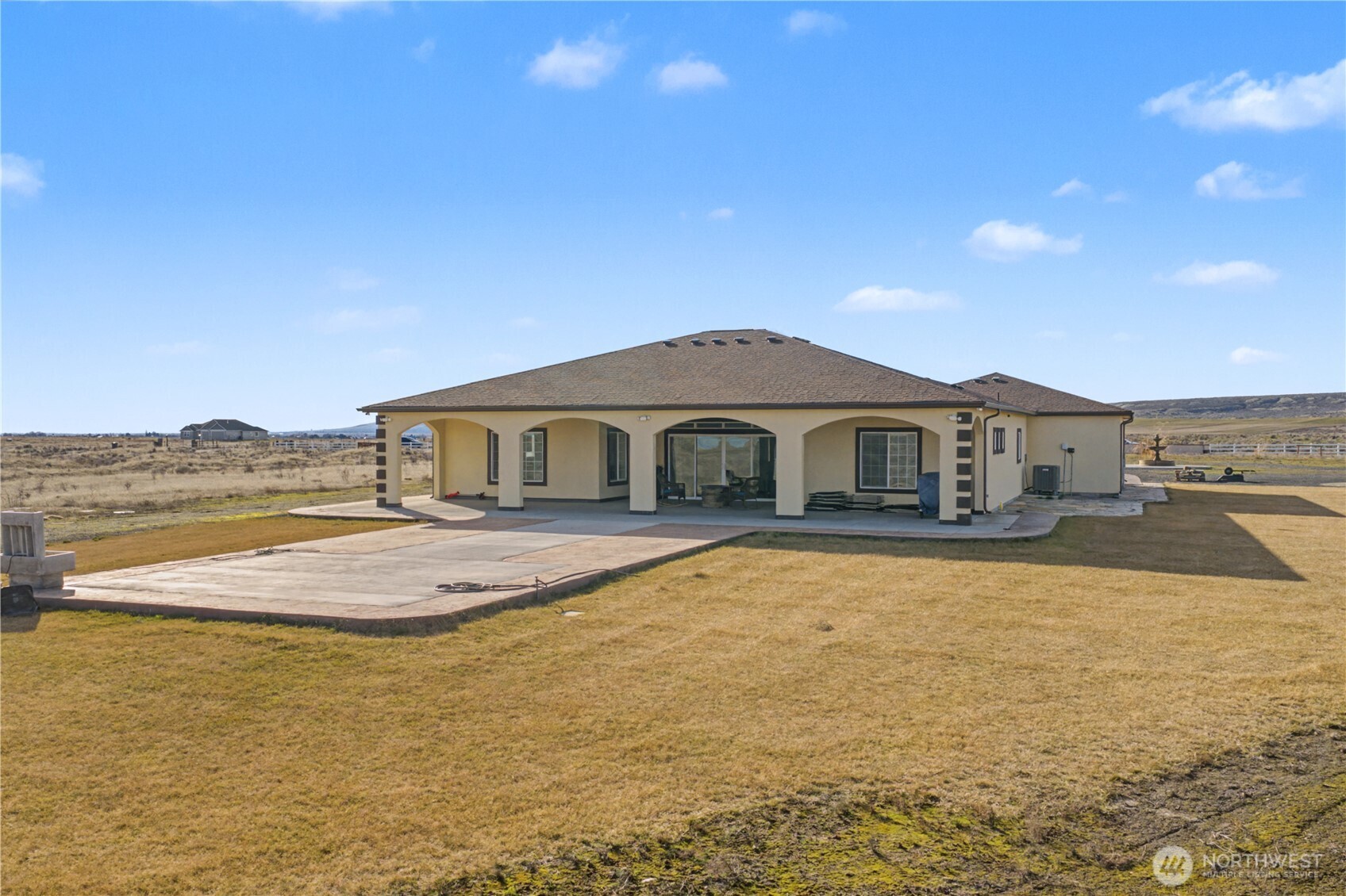 21347 Rd D.5 Soap Lake, WA 98851 - Photo 29 of 40 a front view of a house with swimming pool