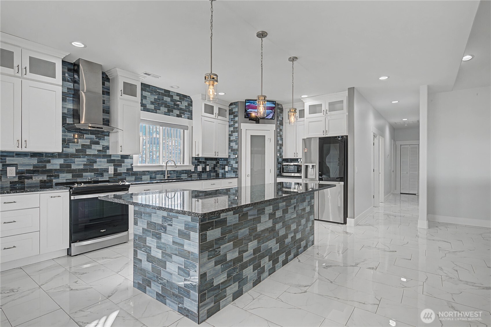 21347 Rd D.5 Soap Lake, WA 98851 - Photo 4 of 40 a kitchen with stainless steel appliances kitchen island granite countertop a stove a sink and a refrigerator