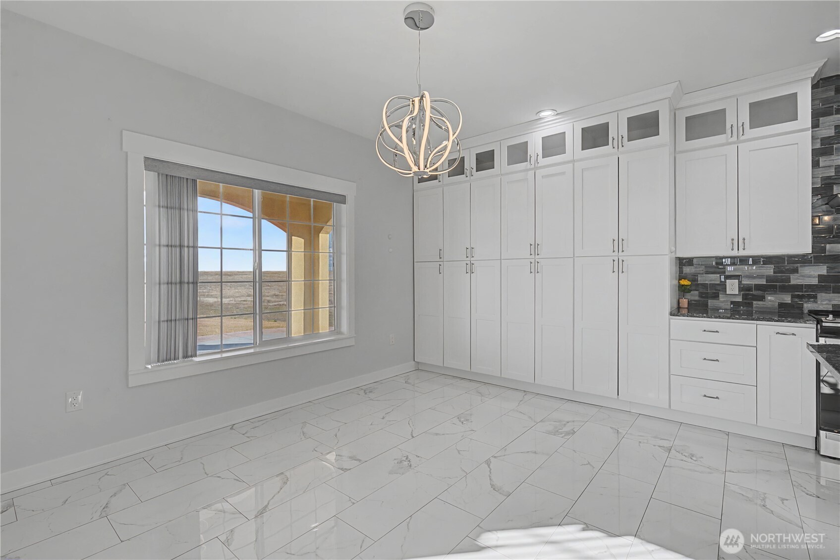 21347 Rd D.5 Soap Lake, WA 98851 - Photo 5 of 40 a view of a livingroom with an empty space and a window