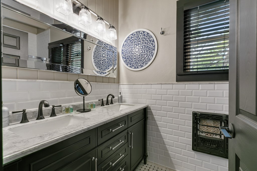 48 Kneese Road Fredericksburg, TX 78624 - Photo 14 of 43 a bathroom with a sink and a mirror