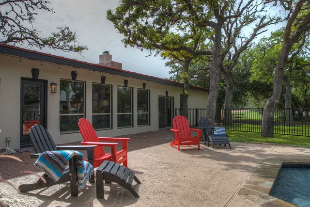 a view of sitting area with furniture and floor to ceiling window