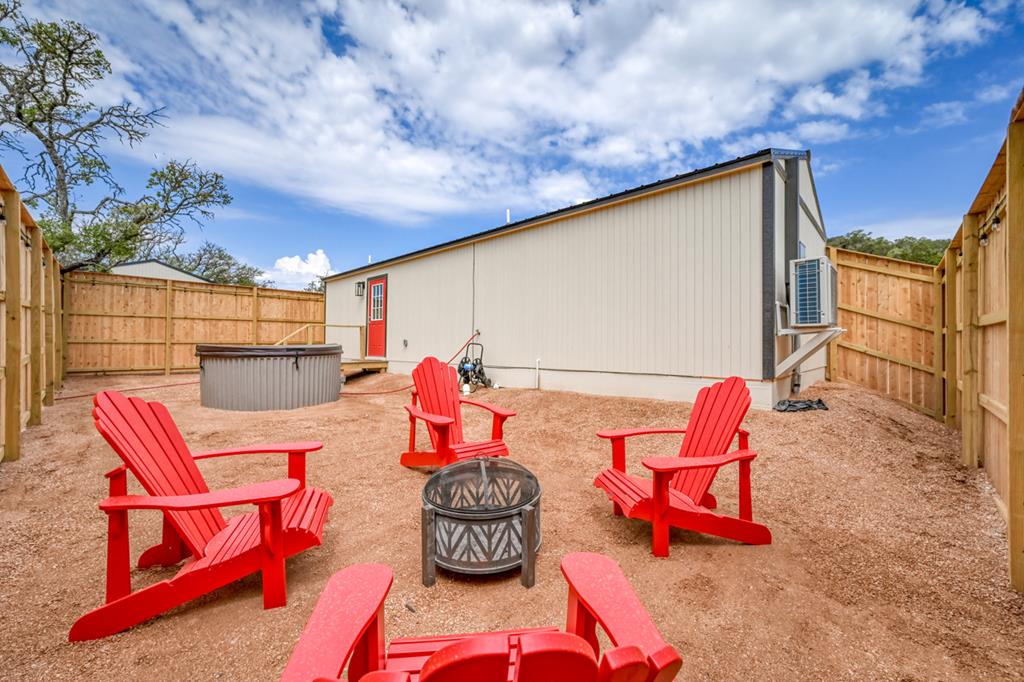 48 Kneese Road Fredericksburg, TX 78624 - Photo 37 of 43 a outdoor space with a patio