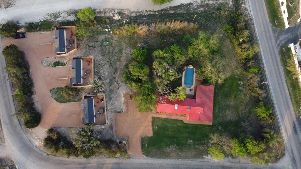 48 Kneese Road Fredericksburg, TX 78624 - Photo 40 of 43 an aerial view of a house with a garden and plants