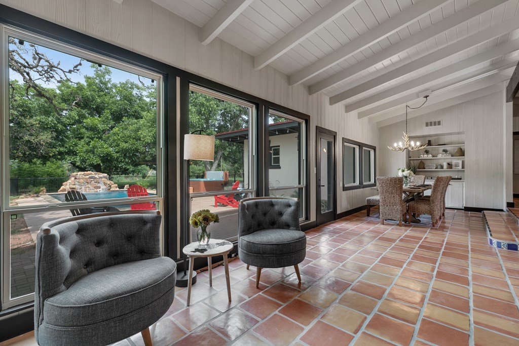 48 Kneese Road Fredericksburg, TX 78624 - Photo 6 of 43 a living room with furniture and a floor to ceiling window
