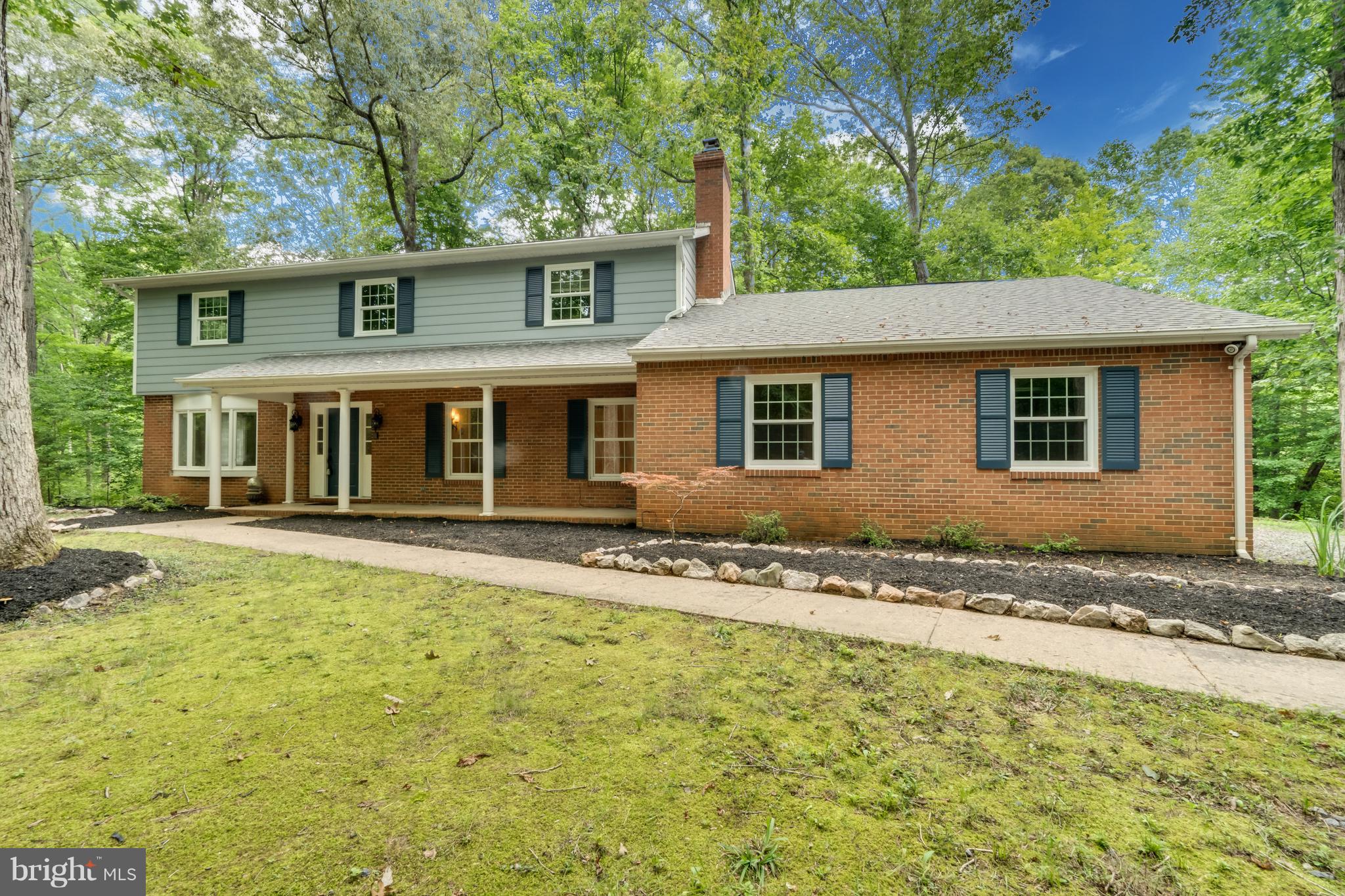 117 Bluff Point Road Fredericksburg, VA 22407 - Photo 1 of 30 front view of a house with a yard