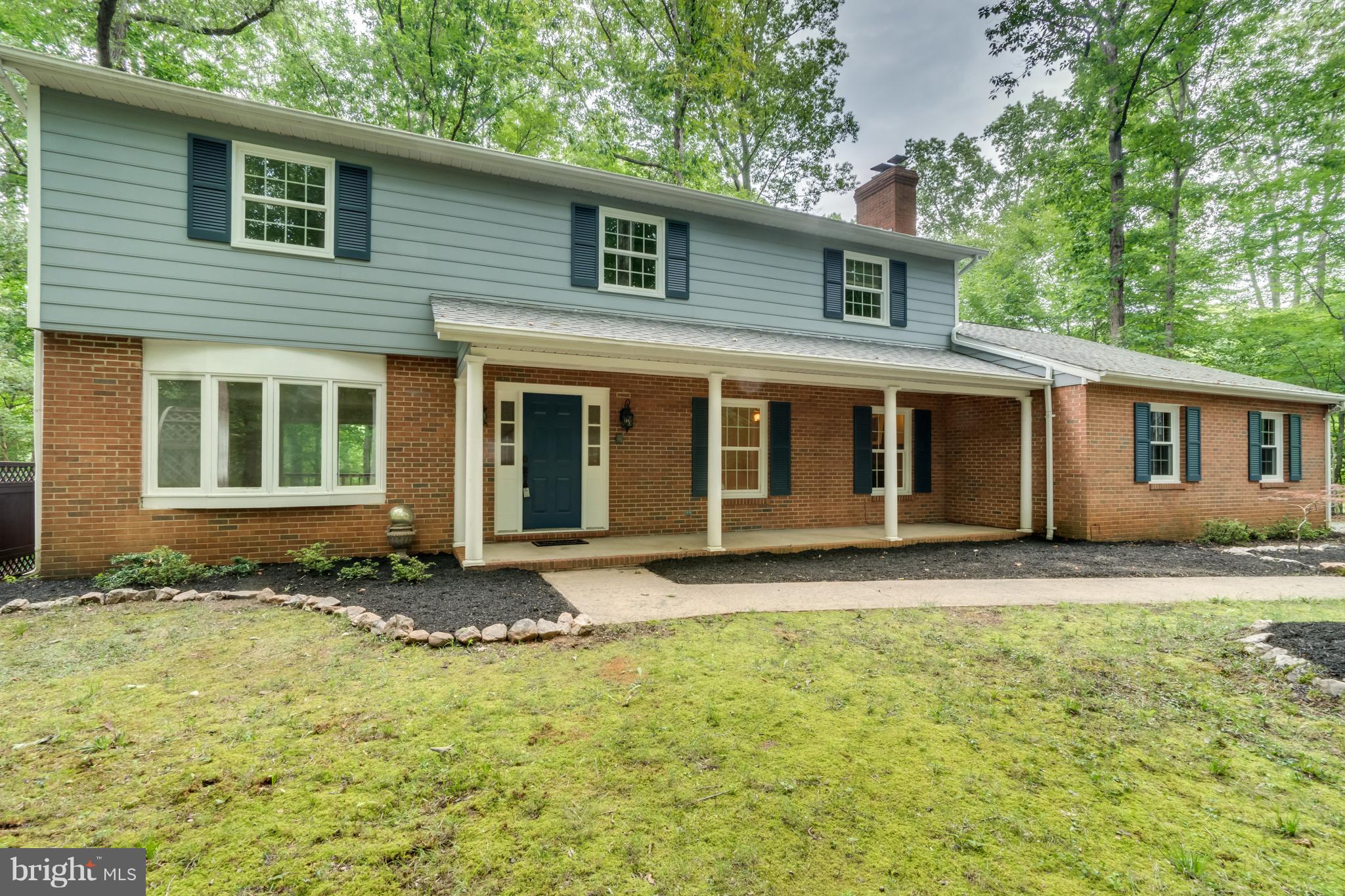 117 Bluff Point Road Fredericksburg, VA 22407 - Photo 2 of 30 a house that has garden in front of it