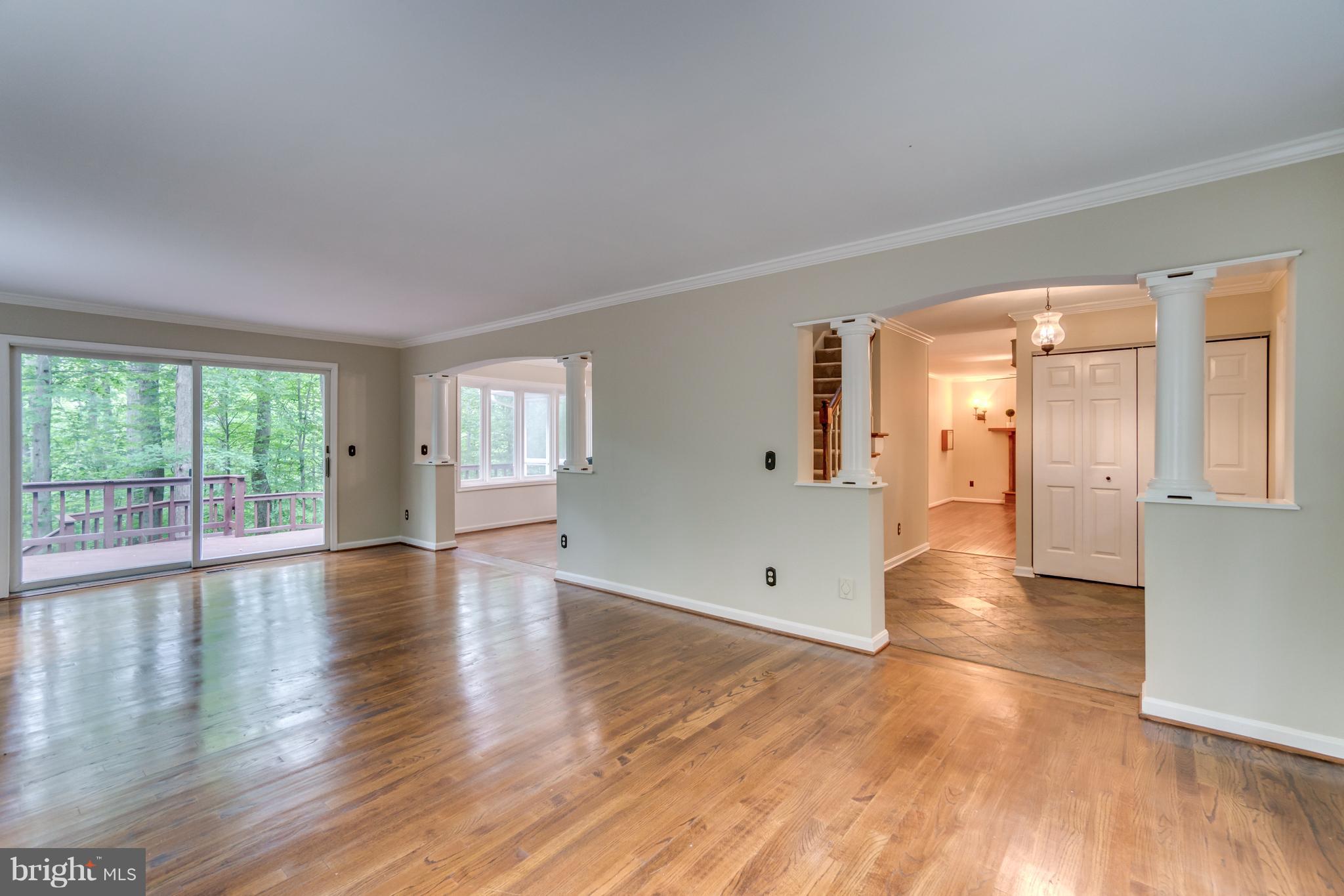 117 Bluff Point Road Fredericksburg, VA 22407 - Photo 7 of 30 a view of empty room with wooden floor and fan