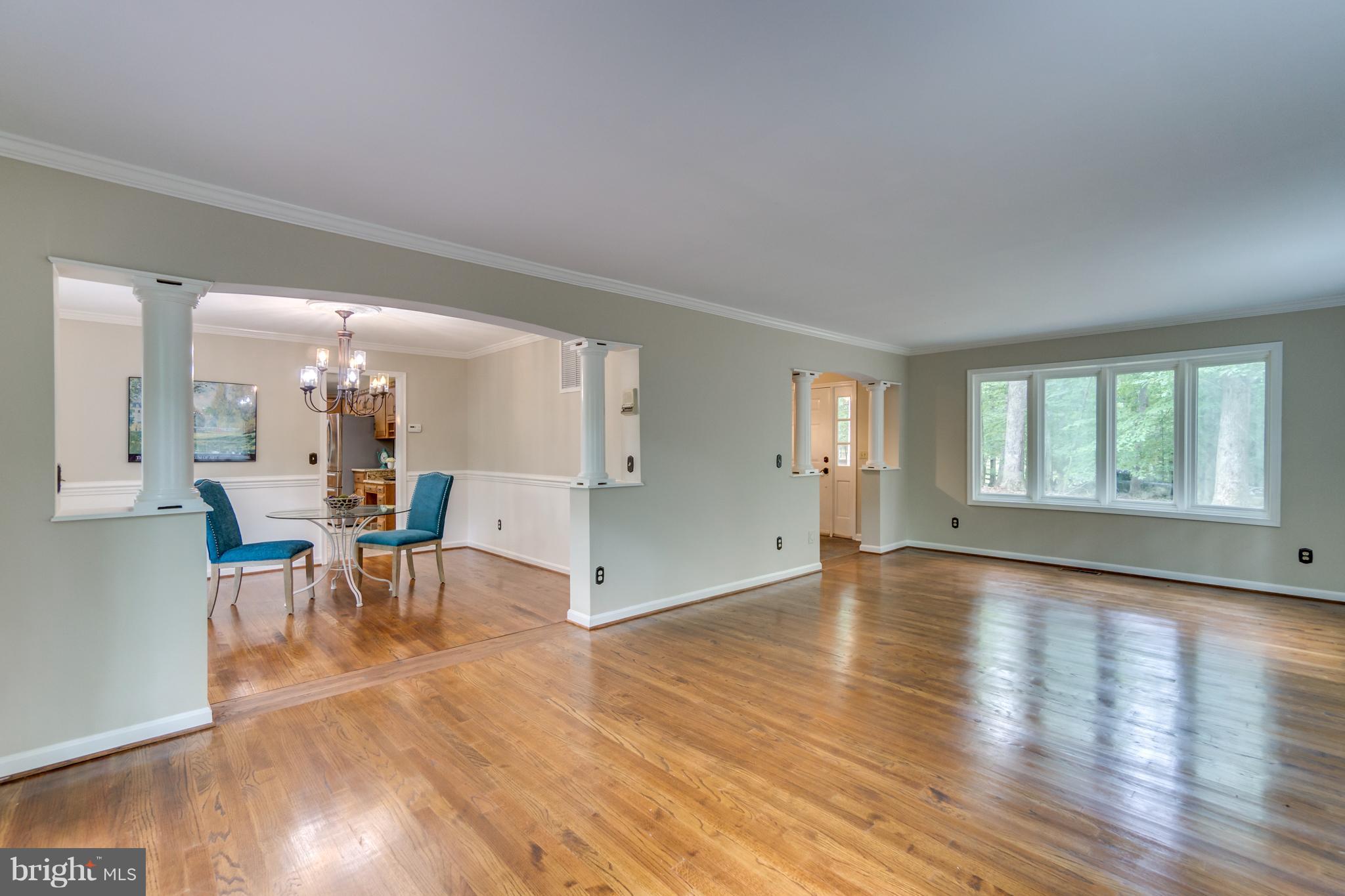 117 Bluff Point Road Fredericksburg, VA 22407 - Photo 8 of 30 a view of empty room with wooden floor and a window