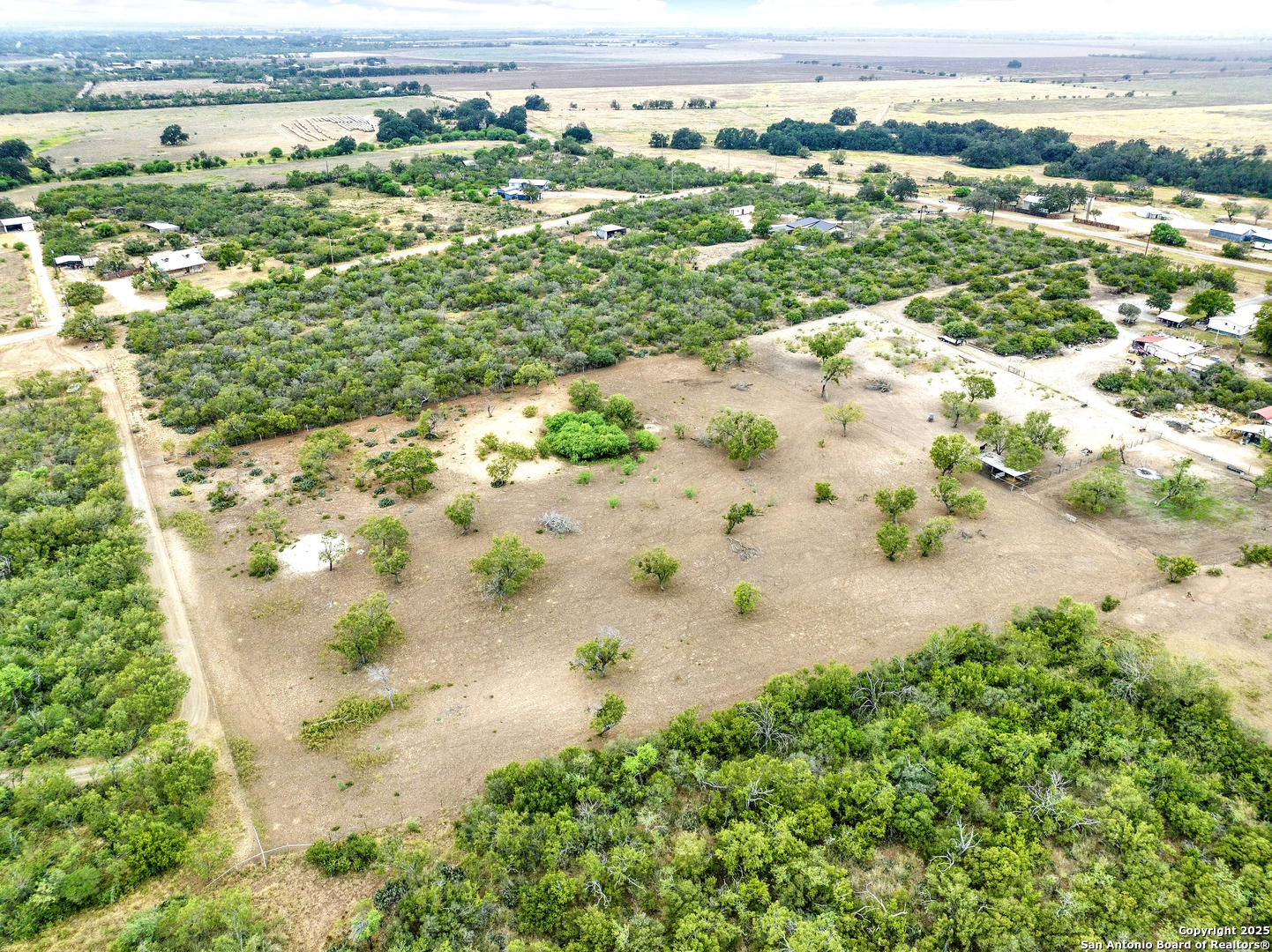 207 Veterans Lane Uvalde, TX 78801 - Photo 3 of 7 an aerial view of a houses with yard