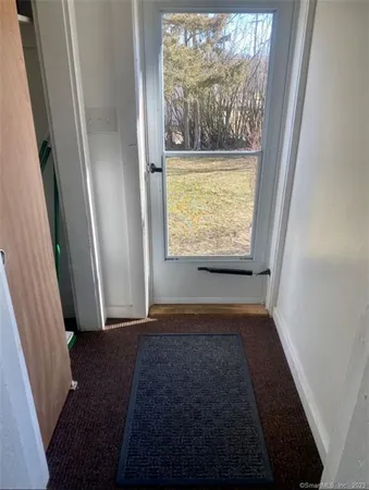 a view of an empty room and window