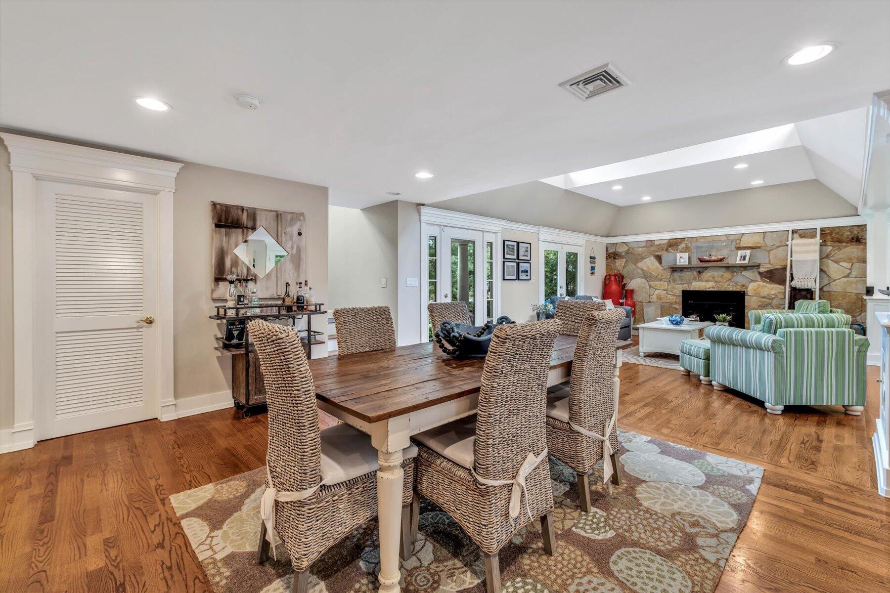 41 Summersea Road Mashpee, MA 02649 - Photo 17 of 39 a view of a dining room with furniture and wooden floor