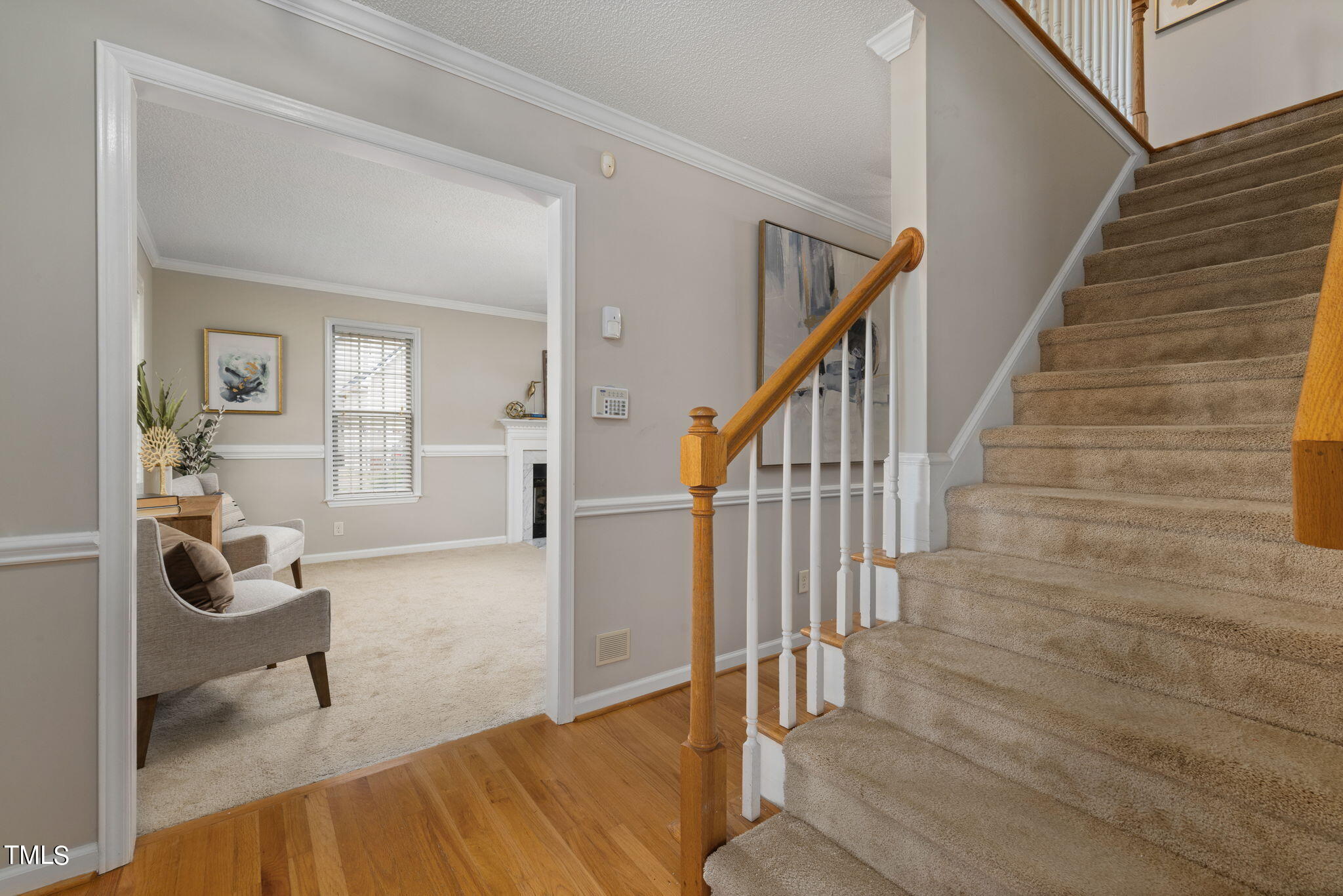1500 Harvey Johnson Road Raleigh, NC 27603 - Photo 18 of 42 a view of entryway and hall with wooden floor