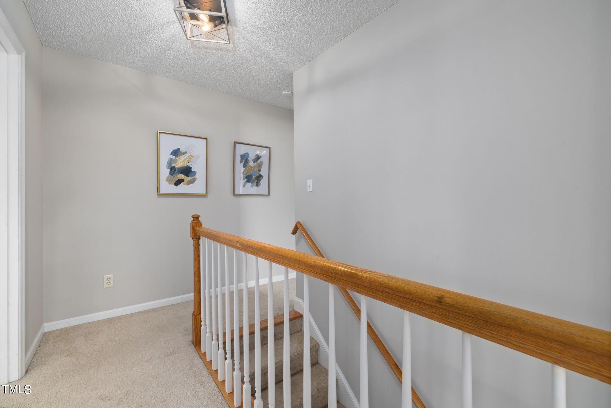 1500 Harvey Johnson Road Raleigh, NC 27603 - Photo 19 of 42 a view of staircase with wooden floor