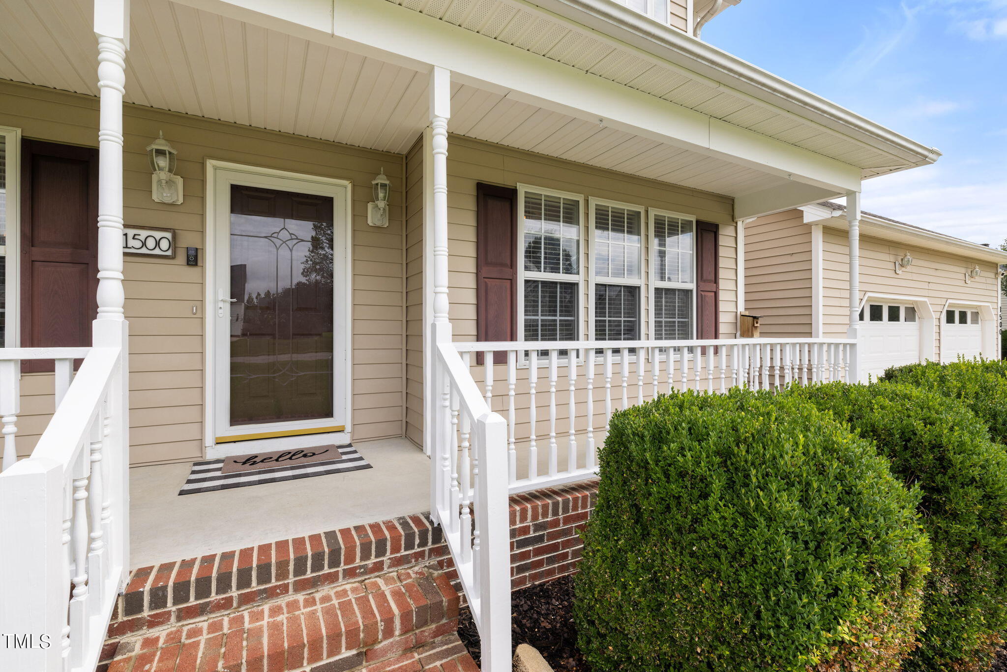 1500 Harvey Johnson Road Raleigh, NC 27603 - Photo 2 of 42 front view of a house with a porch