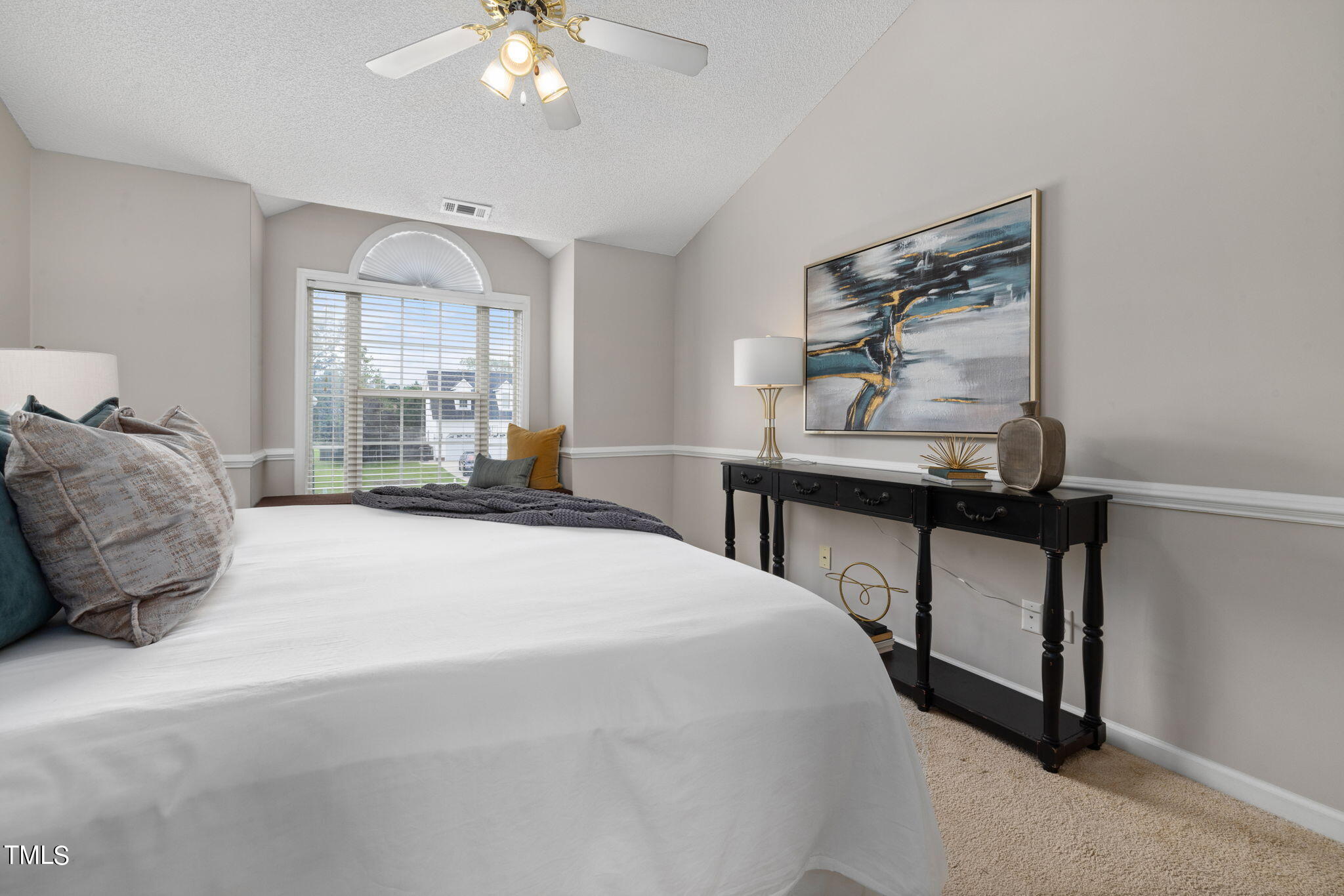 1500 Harvey Johnson Road Raleigh, NC 27603 - Photo 25 of 42 a bedroom with a bed and a window
