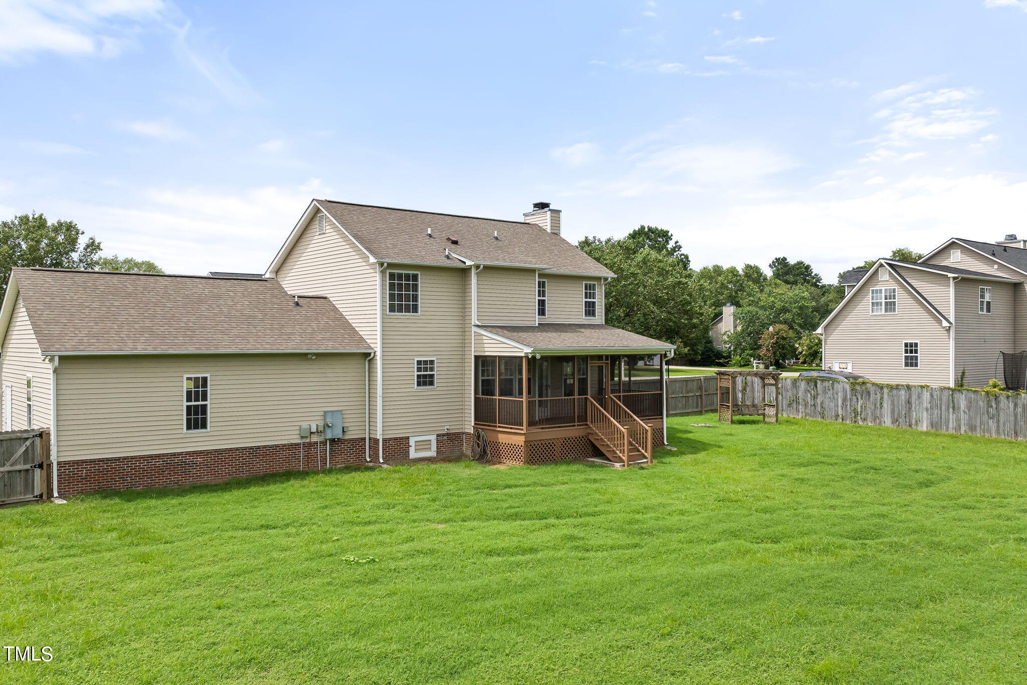 1500 Harvey Johnson Road Raleigh, NC 27603 - Photo 36 of 42 a view of a house with a yard and sitting area