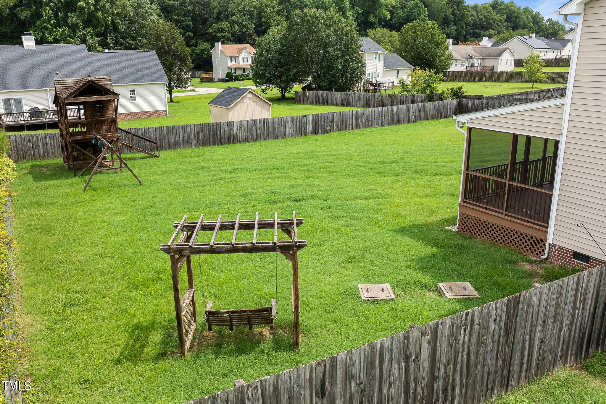 1500 Harvey Johnson Road Raleigh, NC 27603 - Photo 37 of 42 a view of a house with a backyard