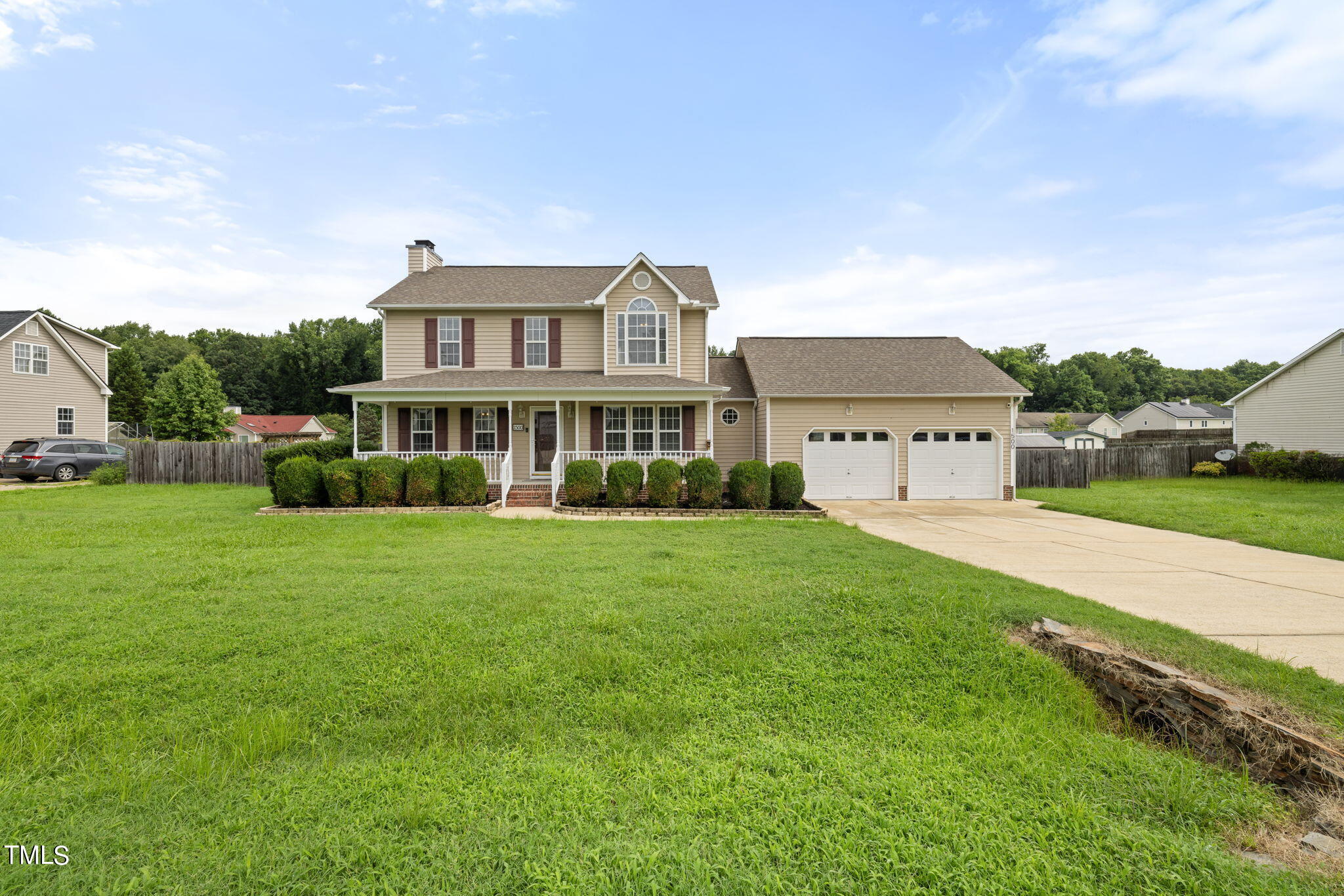 1500 Harvey Johnson Road Raleigh, NC 27603 - Photo 40 of 42 a view of a house with a yard