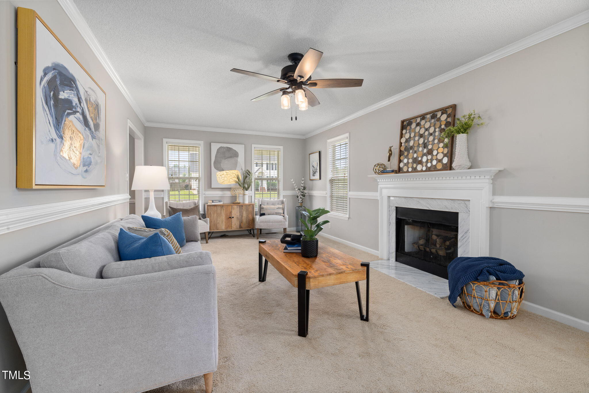 1500 Harvey Johnson Road Raleigh, NC 27603 - Photo 5 of 42 a living room with furniture and a fireplace