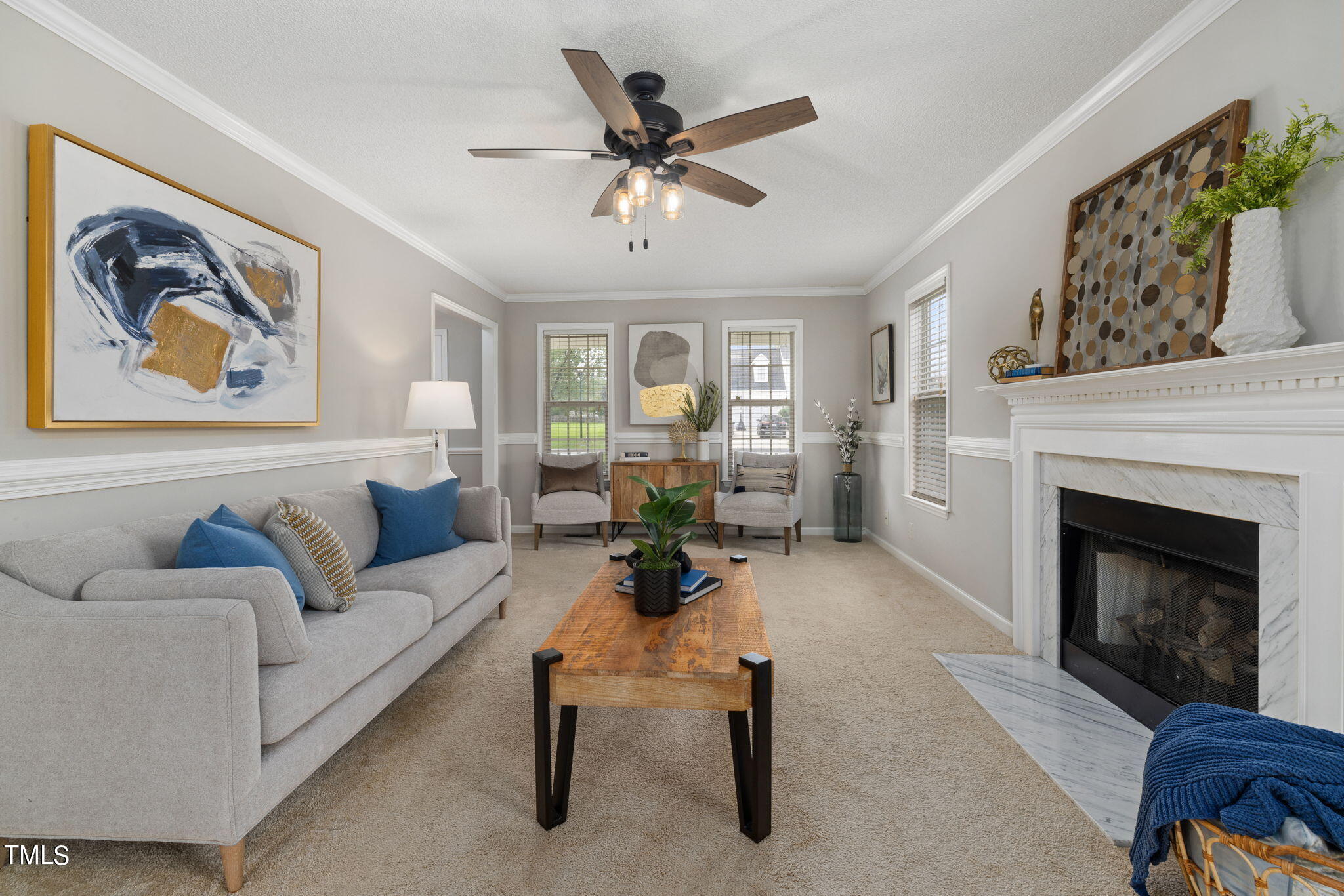 1500 Harvey Johnson Road Raleigh, NC 27603 - Photo 6 of 42 a living room with furniture and a fireplace