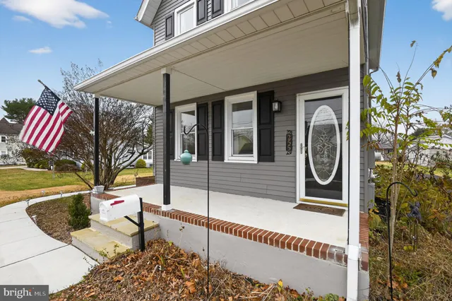 a view of a two chairs in the balcony