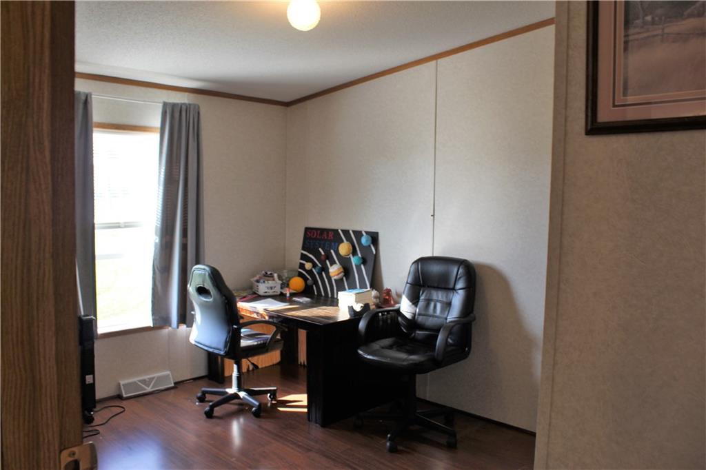 349 Country Lane Road Prospect, PA 16052 - Photo 11 of 25 a view of a workspace with furniture and a window