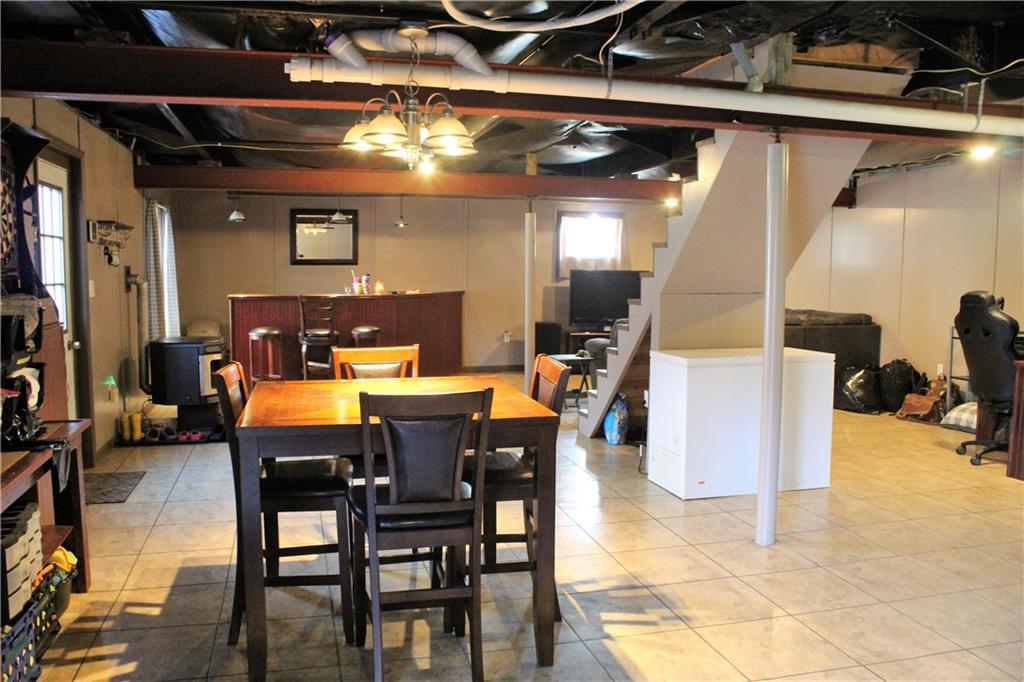 349 Country Lane Road Prospect, PA 16052 - Photo 19 of 25 a view of a dining room with furniture
