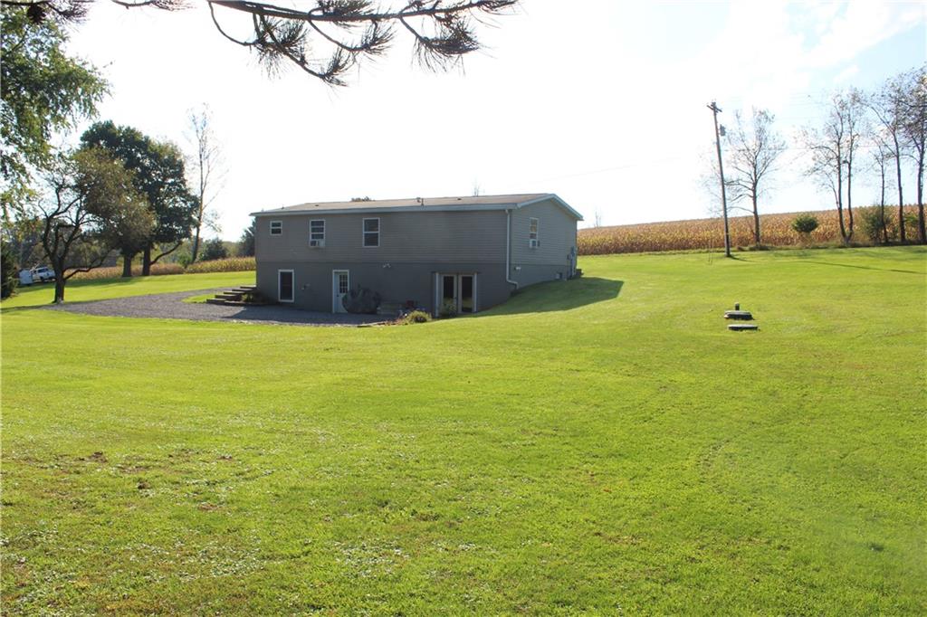 349 Country Lane Road Prospect, PA 16052 - Photo 22 of 25 a view of a field with an trees