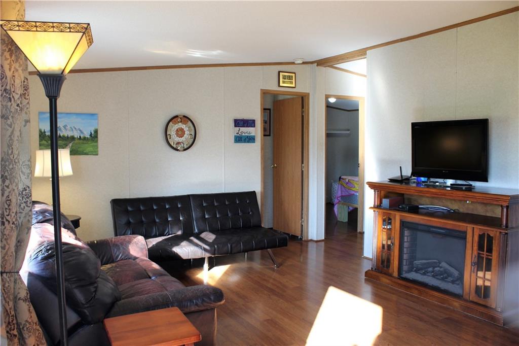 349 Country Lane Road Prospect, PA 16052 - Photo 8 of 25 a living room with furniture and a flat screen tv