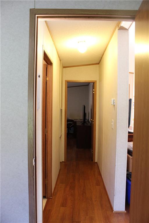 349 Country Lane Road Prospect, PA 16052 - Photo 10 of 25 a view of a hallway with a wooden floor
