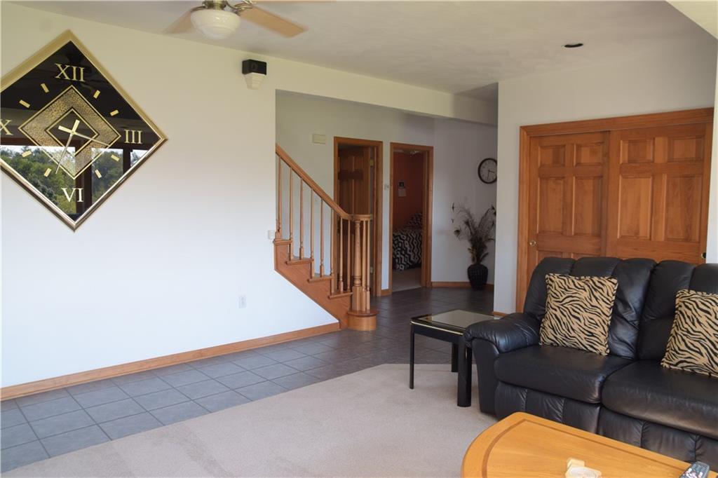 450 Dick Station Road Irwin, PA 15642 - Photo 14 of 24 The main entry is on the lower floor so that your guests can hang up their coats and enjoy this room if stairs are a challenge.